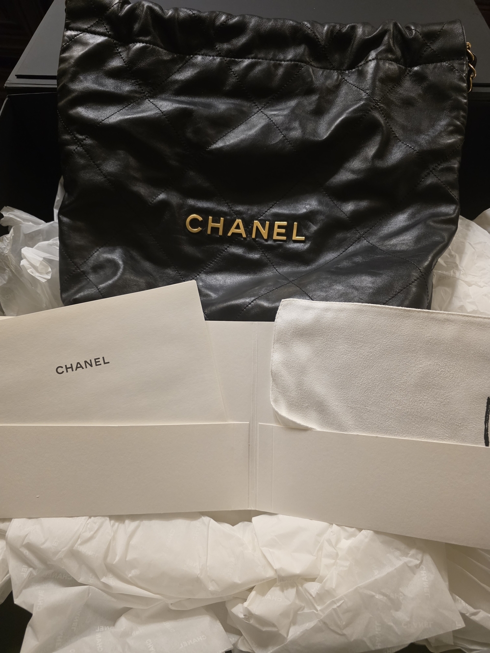 CHANEL Black Quilted Leather Hobo with Gold CHANEL Lettering